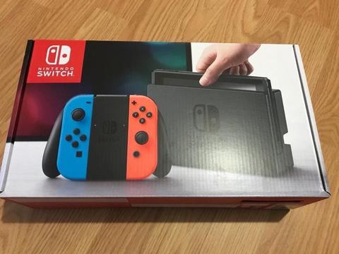 nintendo switch neon / blue ,all boxed ,everything as new , 4 games (3 are still sealed) , as new !