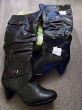Brand new boxed black boots size 8