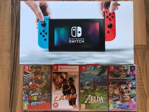 nintendo switch neon / blue ,all boxed ,everything as new , 4 games (3 are still sealed) , as new !