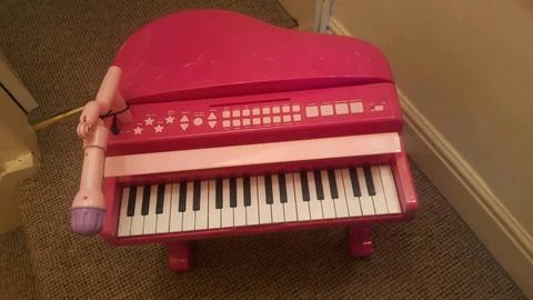 Kids pink grand piano