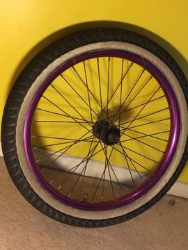 Purple bmx wheel