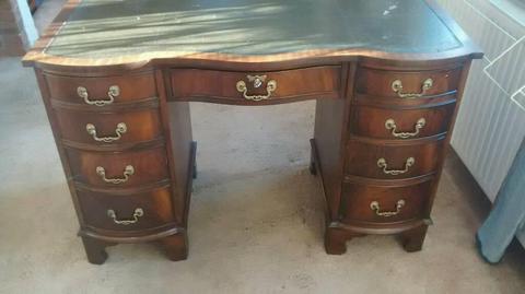 BEVAN AND FUNNELL SERPENTINE FRONTED KNEEHOLE WRITING DESK
