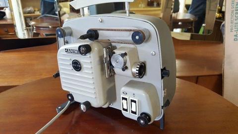 Hanimex Slide Projector With Rank Da-Lite Projector Screen