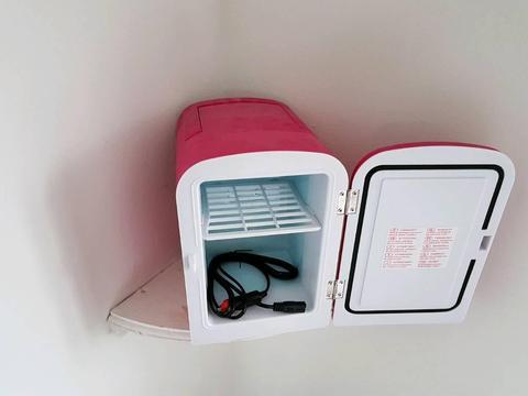 Pink mini car fridge