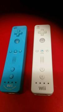 2 Wii controllers and Wii fit plus board and game
