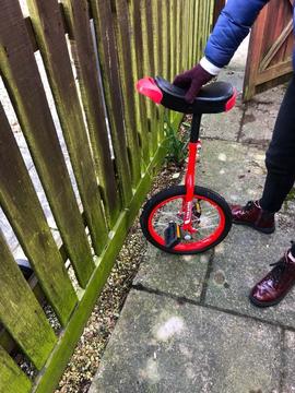 Red unicycle