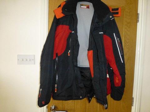 Good used condition Brugi Men’s Black red and orange ski jacket size Large