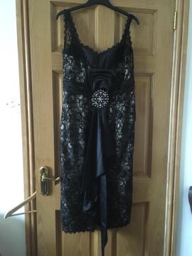 Beautiful cocktail dress black lace with beautiful dimonte at back