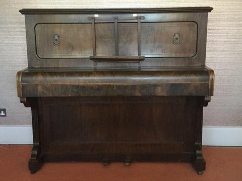 Old piano looking for loving new home!