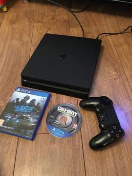 PS4 slim with 2 games