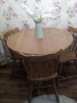 Solid pine table and three chairs great for a shabby chic project