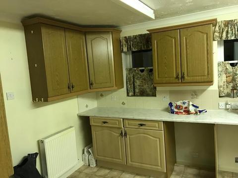 Kitchen cupboards, cooker hood, work top