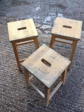 Old wooden lab stools