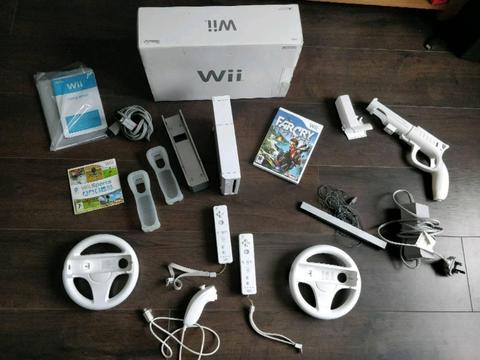 Nintendo Wii with 2 controllers and a game