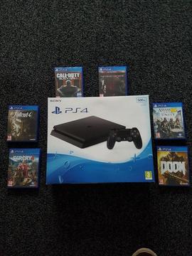 Ps4 slim 500 gb only used one boxed with 6 games