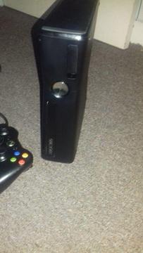 Xbox 360 slim with 18 games and 320g hard drive