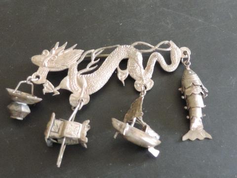 Silver Chinese Dragon brooch with charms