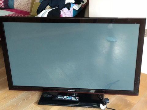 ** 50 inch Samsung Television and Oak tv stand**