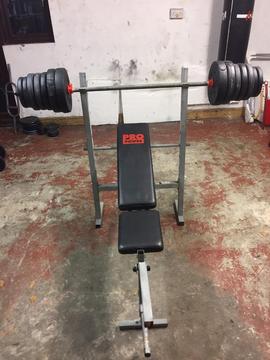 Weight training bench and vinyl weights