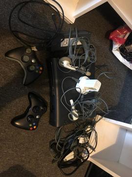 Xbox 360 elite, extras and 27 games
