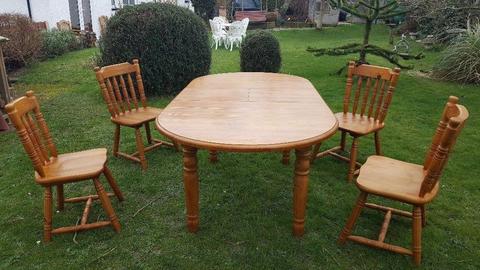 Extending pine table and 4 chairs