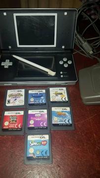 Ds lite charger and 7 games