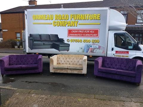 Purple and gold button back sofas