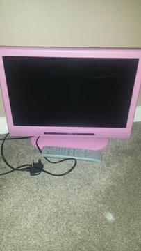 small pink TV with universal remote