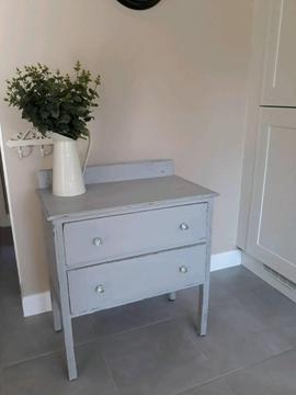 Soft grey drawers with crystal handles