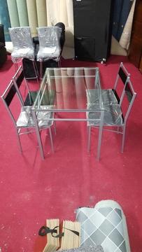 brand new tokyo glass dining table with 4 chairs