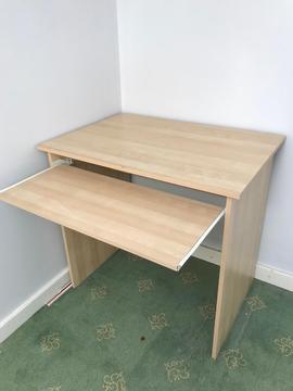 Desk with pull out shelf