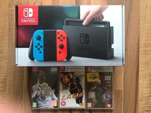 nintendo switch neon / blue ,all boxed ,everything as new , 3 games (2 still sealed) PRICE STANDS !