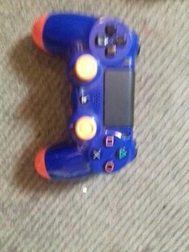 BLUE AND ORANGE / PS4 CONTROLLER / FULLY WORKING AND MO DD ED /FOR SALE OR SWAP ME ?