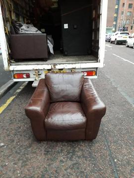 Brown leather armchair £49