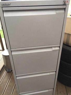 Strong grey metal 4 drawer filing cabinet for hanging files, with key