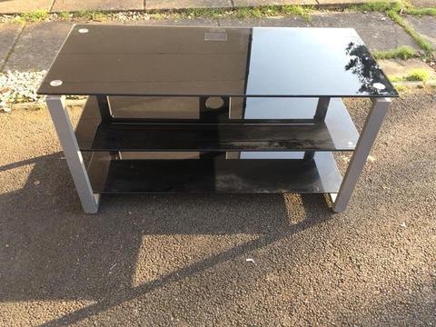 Black glass tv unit with metal stand