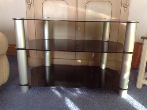 Three tier tv stand shelves black glass with silver supports