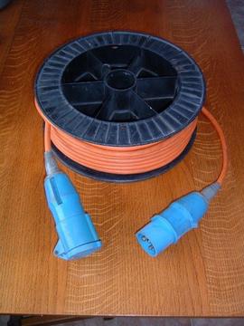 Caravan hook up cable 25m coiled on reel