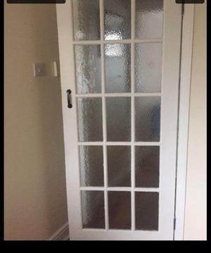 Free interior door with Flemish glass
