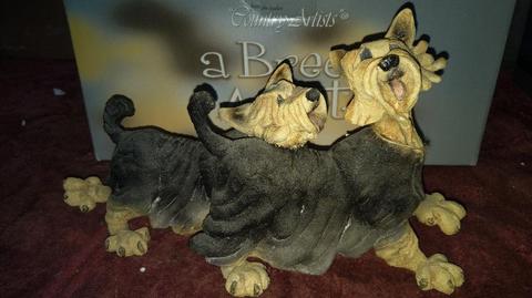 A COLLECTION of 4 A Breed Apart Ornaments