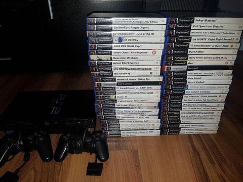 Ps2 with 2 controllers and 50 games