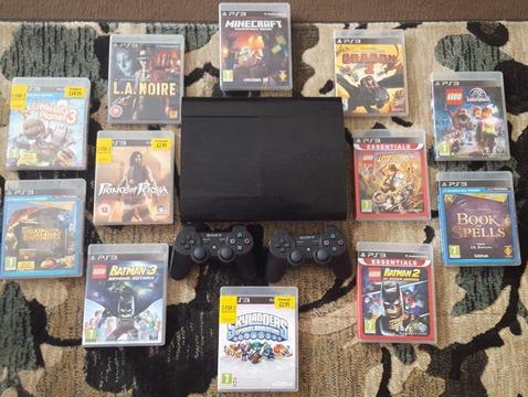 PS3 Bundle -Super-slim console, 12 games, 2 controllers and PS3 Move controller and Camera for sale!