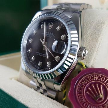 New bagged and boxed set silver strap with black dial Rolex datejust watch automatic sweeping