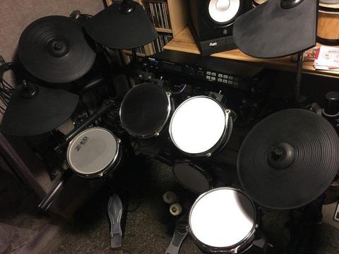 Alesis DM5 Pro Electronic Drum kit customised with extra cymbals and part mesh heads