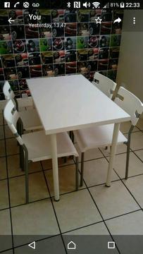 Free white table and chairs