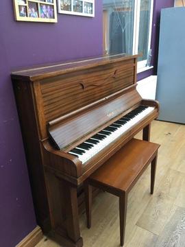 Piano - upright with stool. Has not been retuned since move