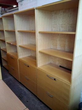 Solid bookcases with storage drawers