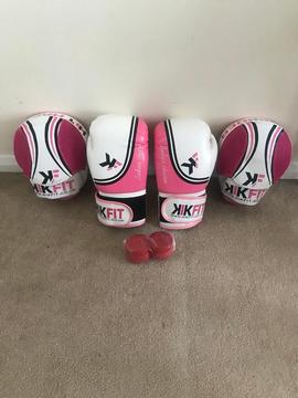 Women boxing gloves and pads