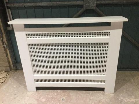 White wooden radiator cover