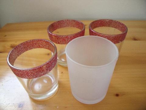 4 x tea light or small votive candle holders. £1 the lot